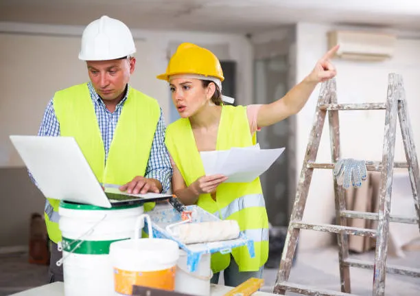 erson comparing features and pricing before buying home renovation software